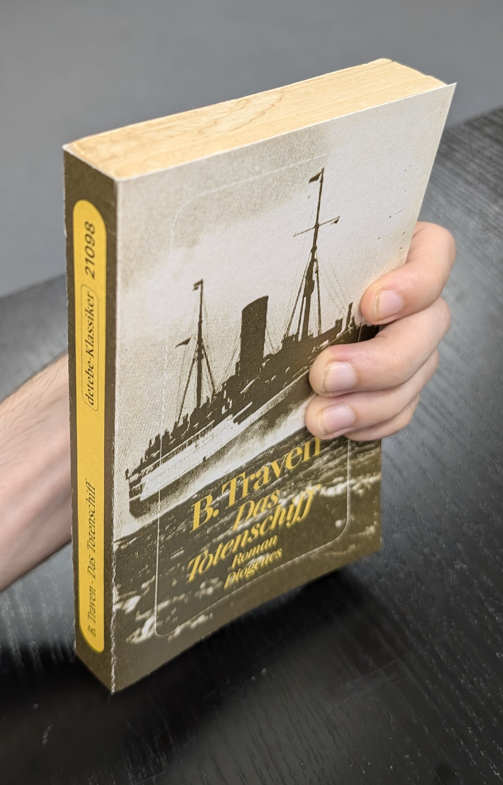 The new cover held to the book block