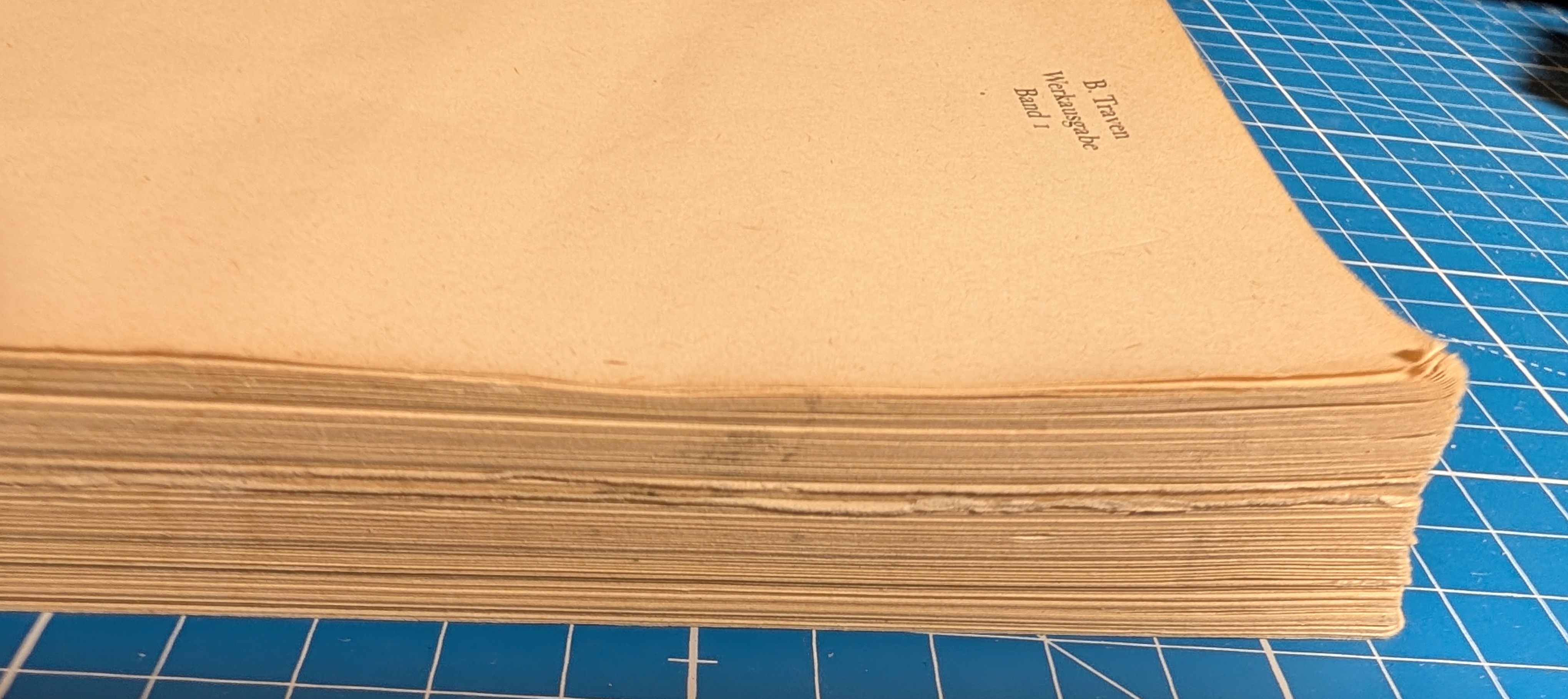 The side of the book with uneven pages sticking out